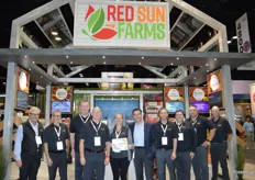 Team Red Sun Farms. Leona Neill shows the award the company won for Best Inland Booth in Produce. Congratulations!